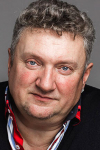 Актер Олег Комаров